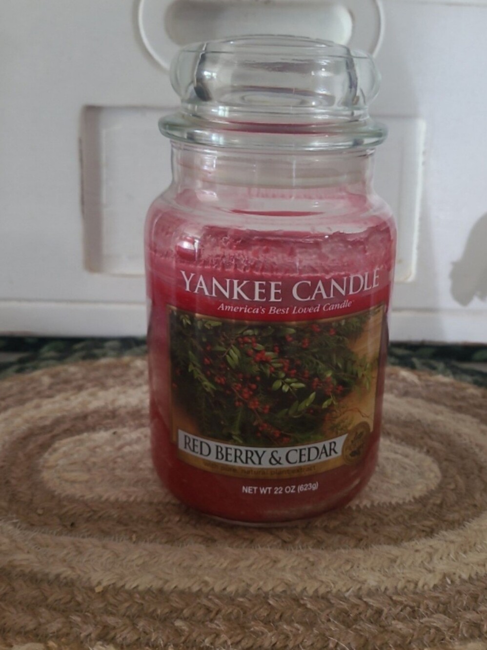 Yankee Candle Red Berry and Cedar preburned candle, about 75% remains of 22 oz